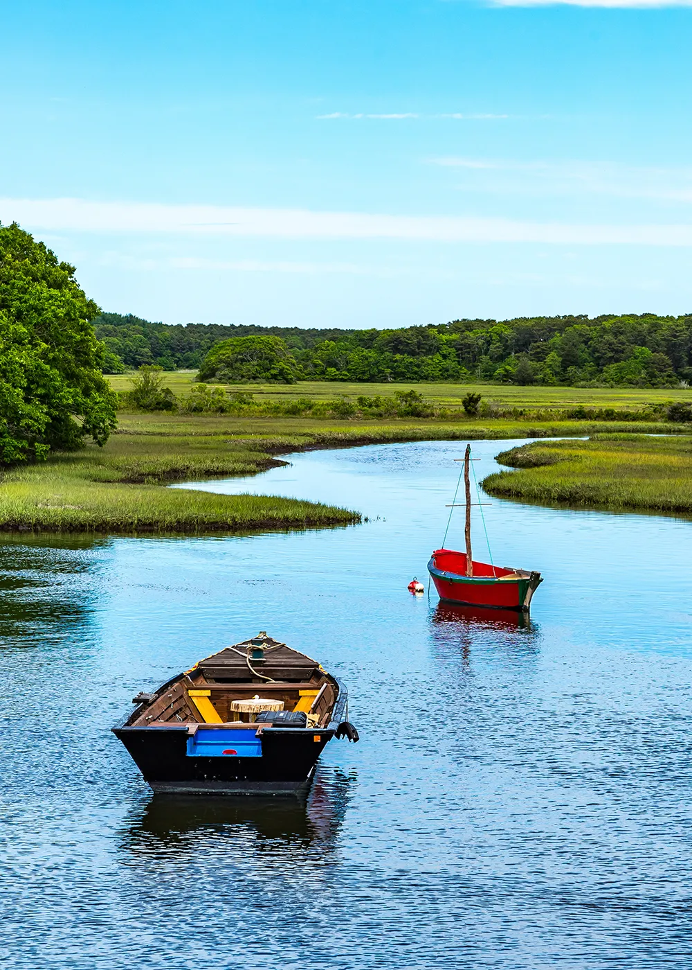 2 small boats in an estuary